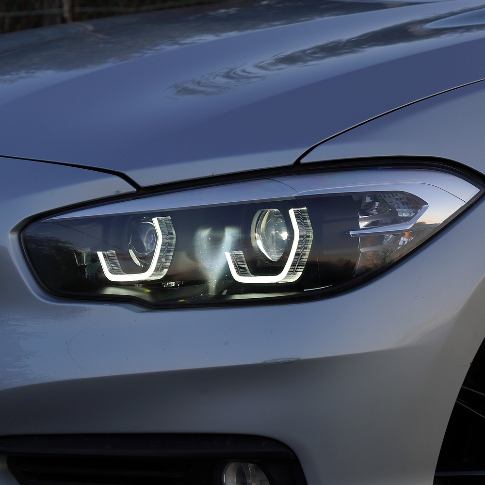 Side close-up of LED daytime running lights on BMW 1 Series F20/F21 LCI
